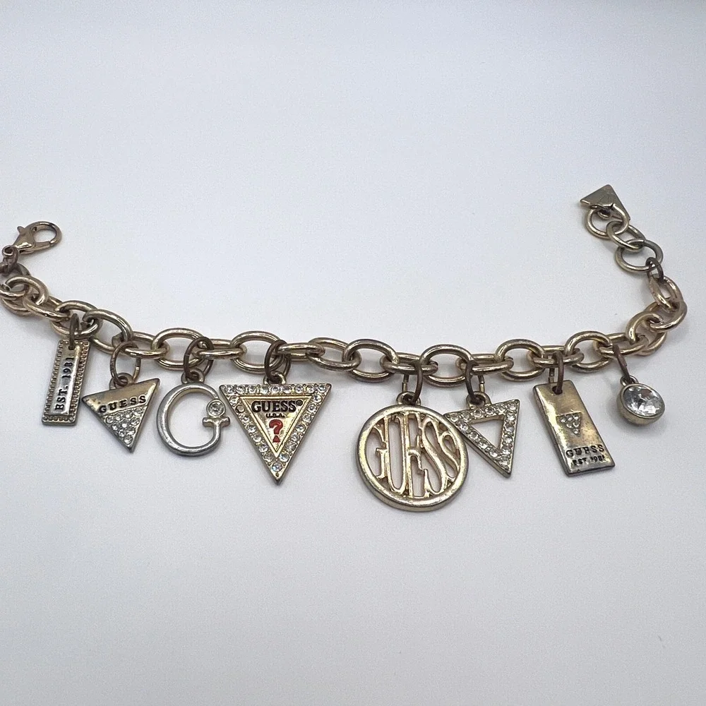 GUESS Vintage Gold Tone Charm Bracelet Rhinestone Logo Est 1981 Y2K Signed